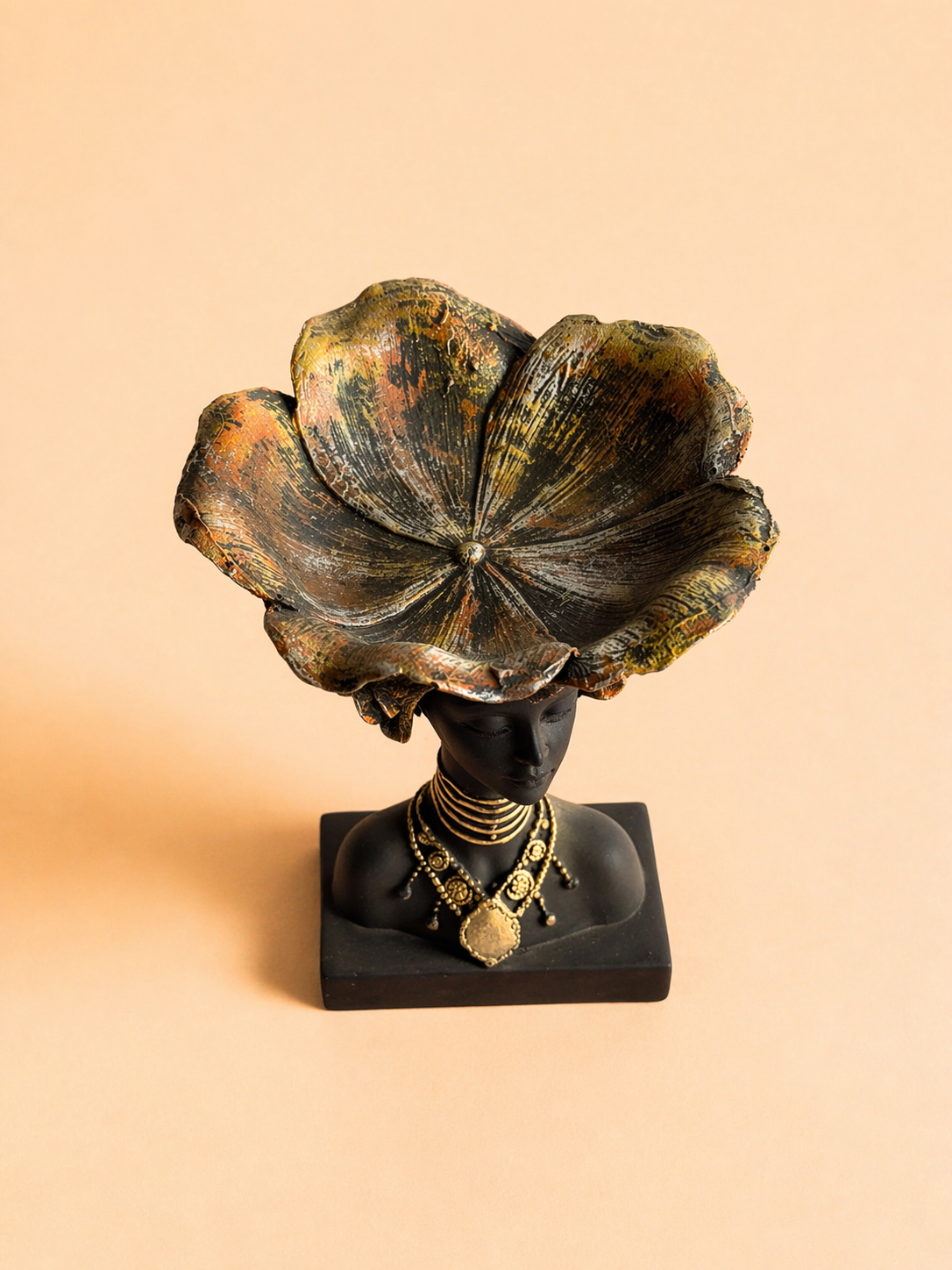 Handcrafted African lady head sculpture decor with crown, showcasing elegance and cultural artistry.