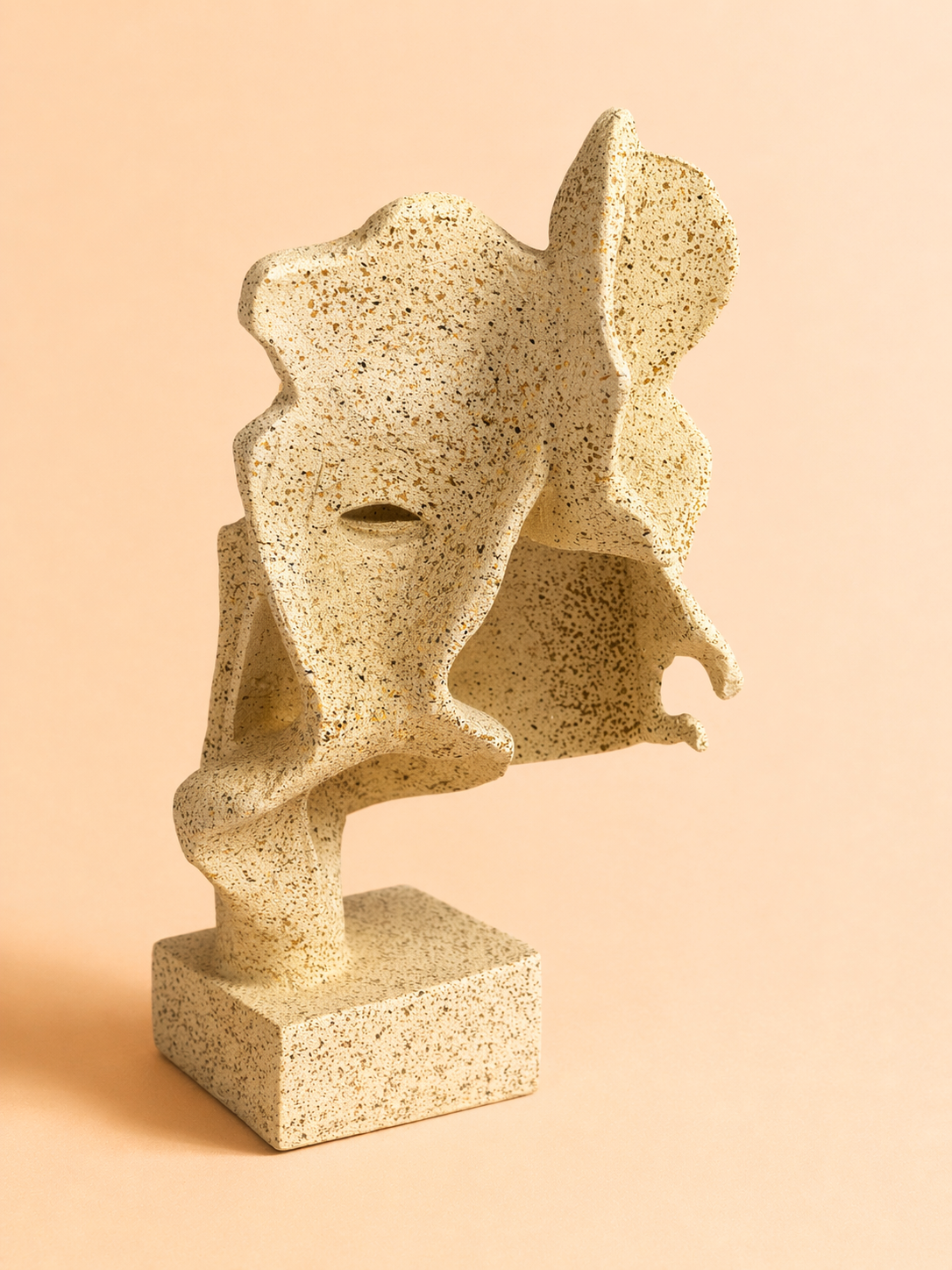 Handcrafted abstract face sculpture decor in modern style for home or office interior.