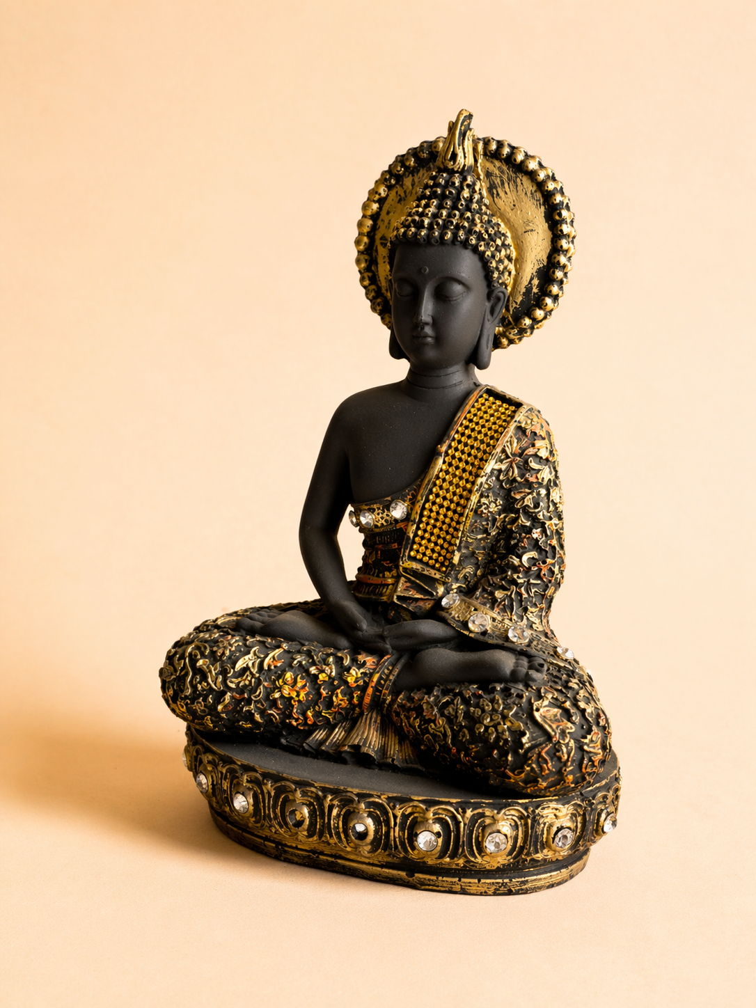 handcrafted black gold Buddha idol