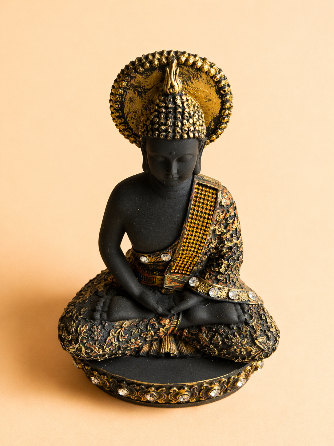 handcrafted black gold Buddha idol
