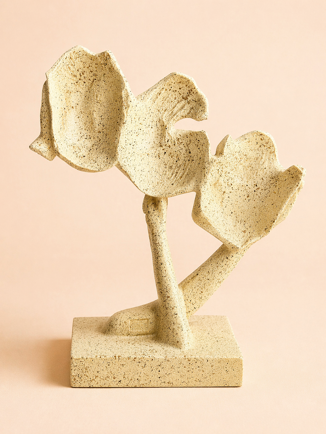 handcrafted abstract face sculpture