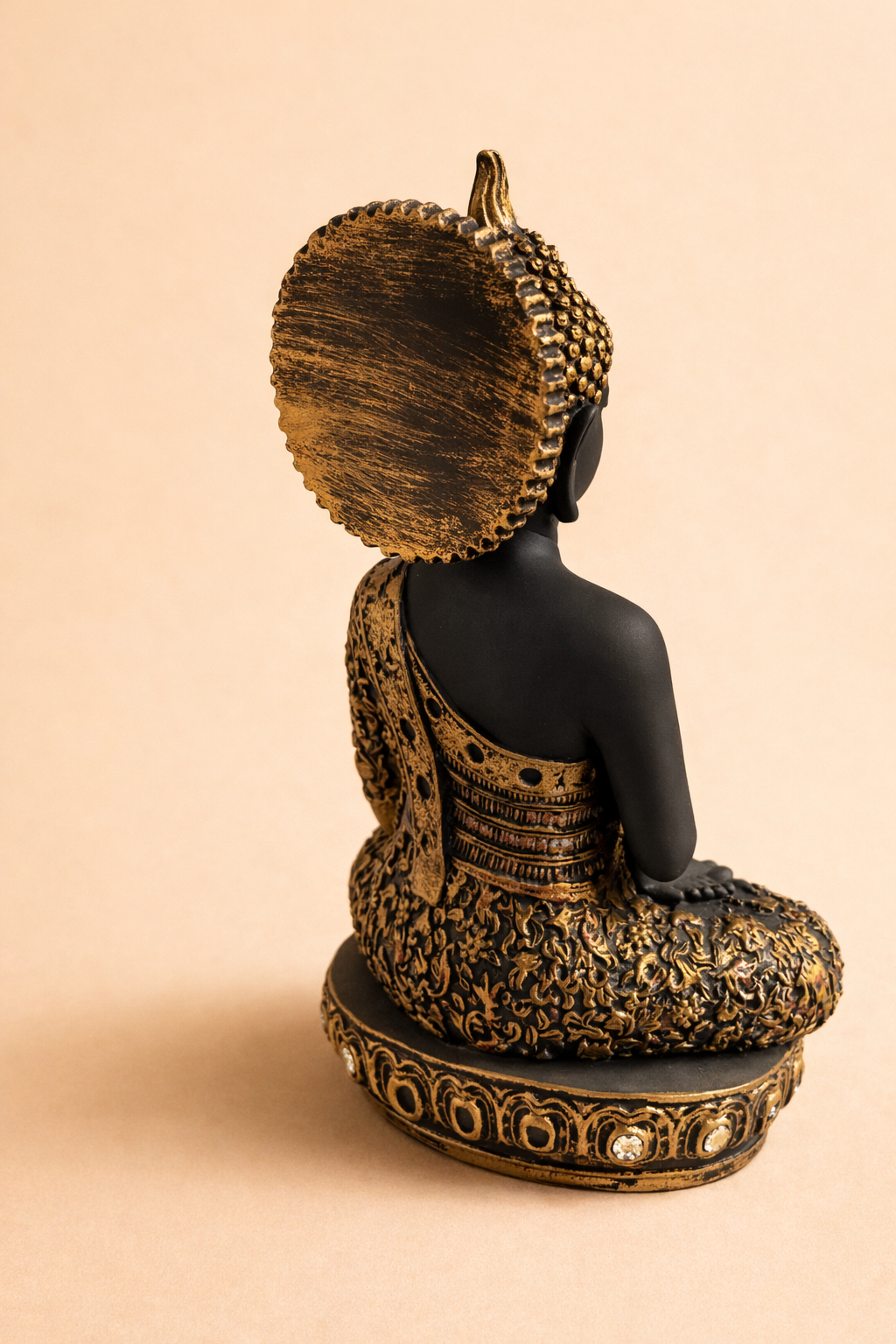 handcrafted black gold Buddha idol