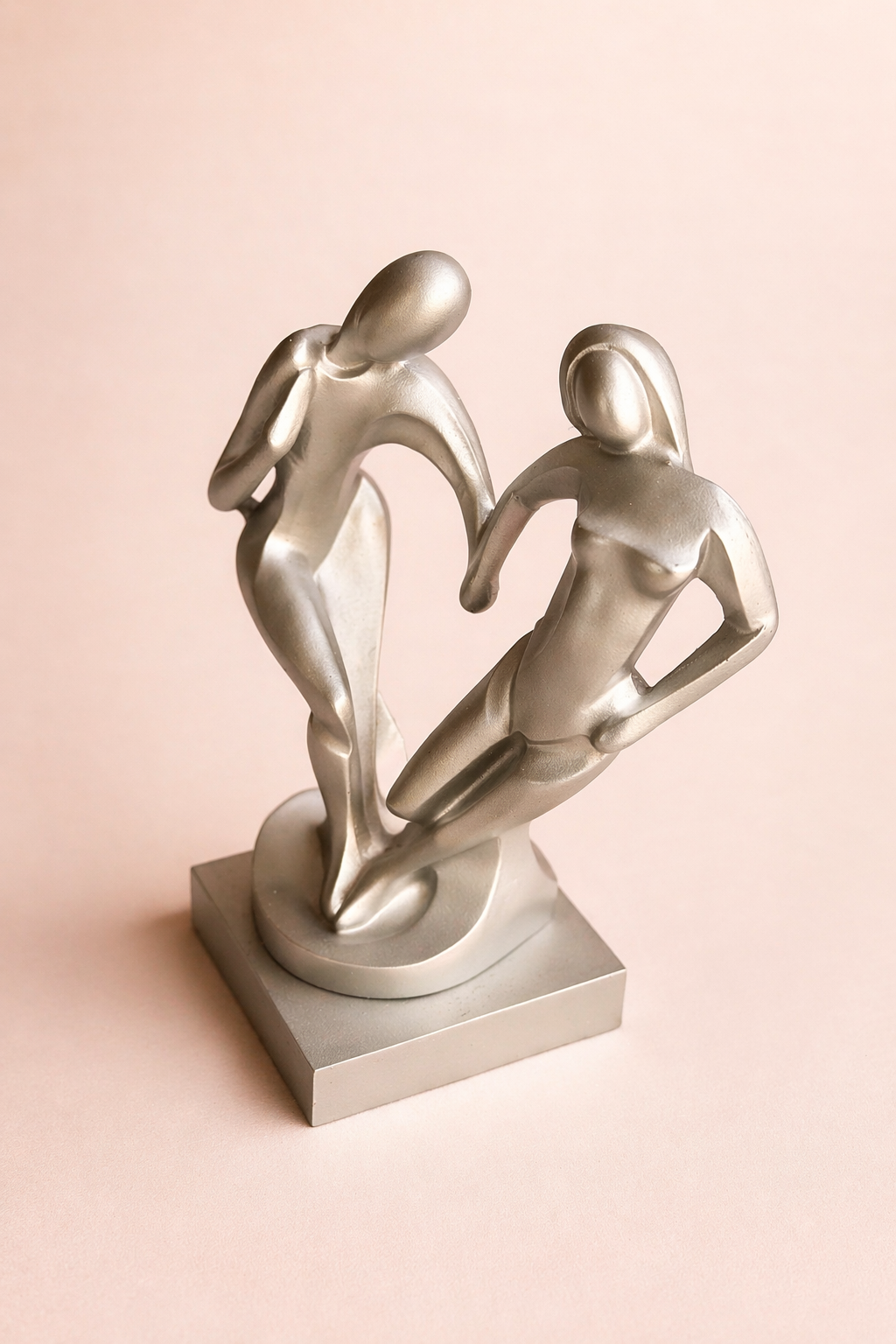 handcrafted couple heart sculpture