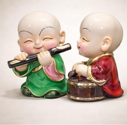 set of 4 smiling monk figurines colorful ceramic buddhist home decor showpieces India smiling monk figurines set for home decor India