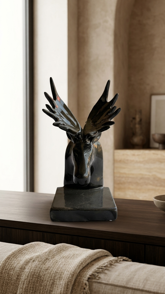handcrafted black deer head sculpture