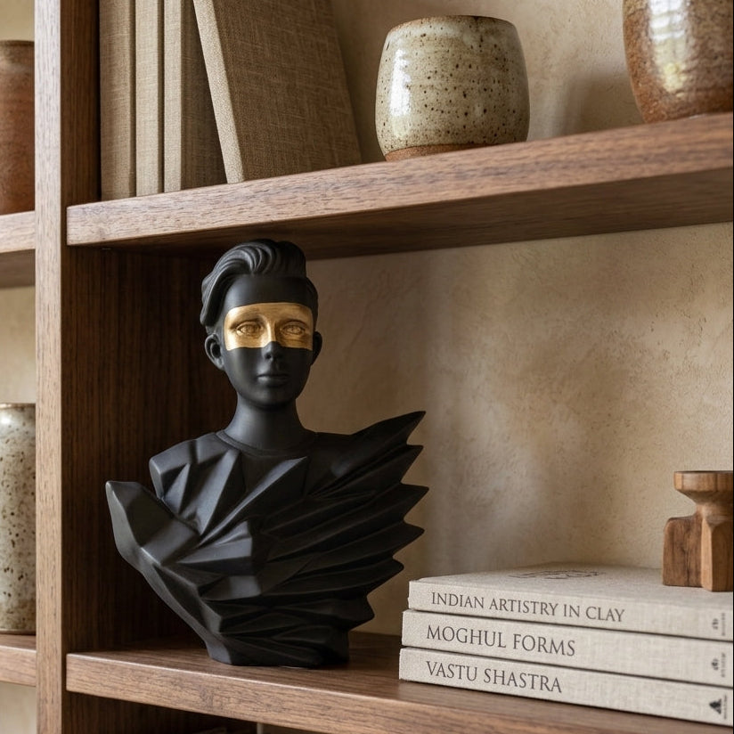Handcrafted Geometric Gentleman Sculpture displayed on a wooden shelf with books and decorative items.